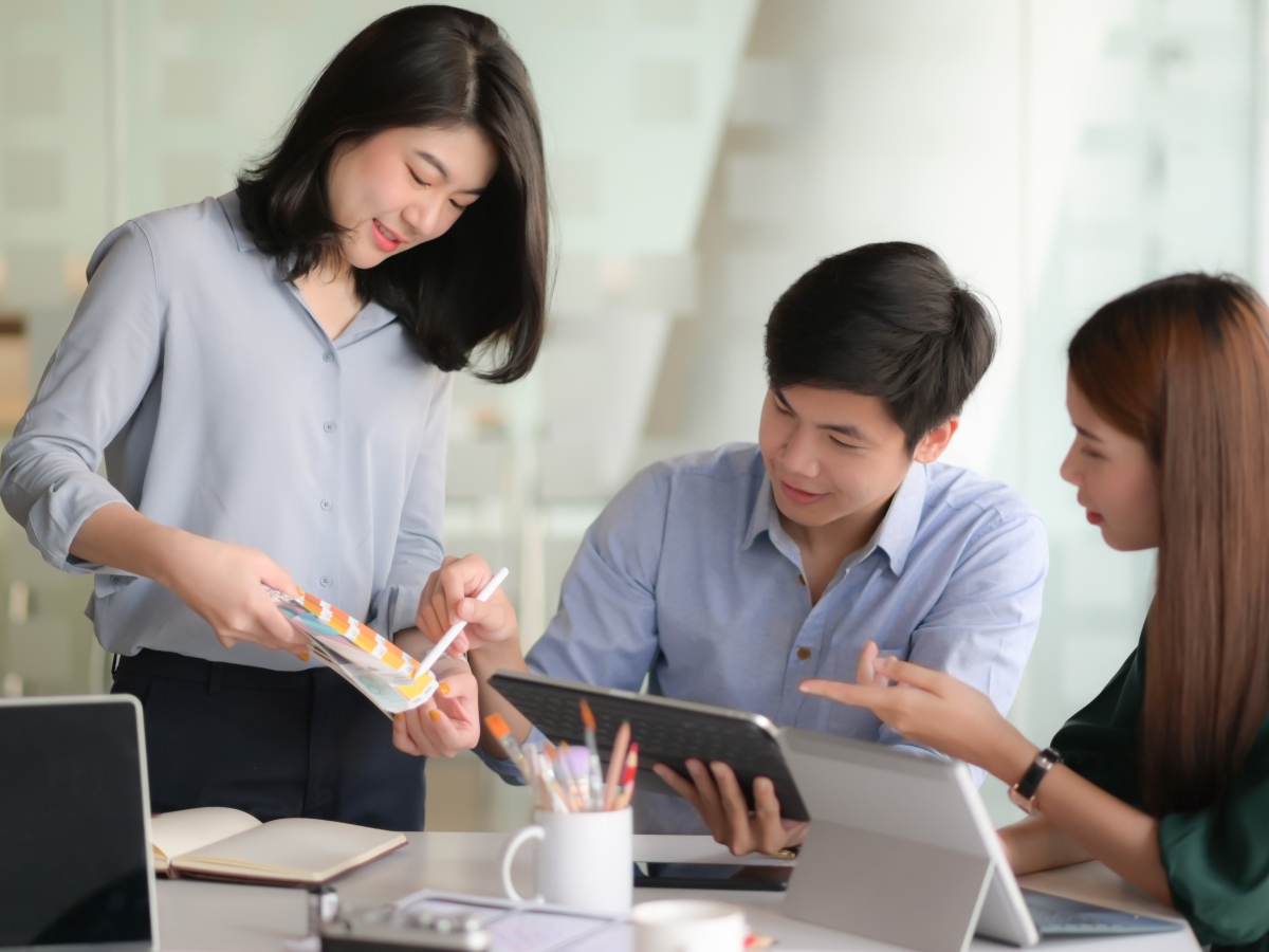 business-people-meeting-office-with-graph-chart-board-collaboration-discussion-financial-report-scaled